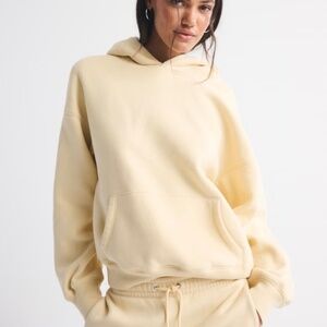 Hollister mens ICon hoodie in light yellow size medium (102)